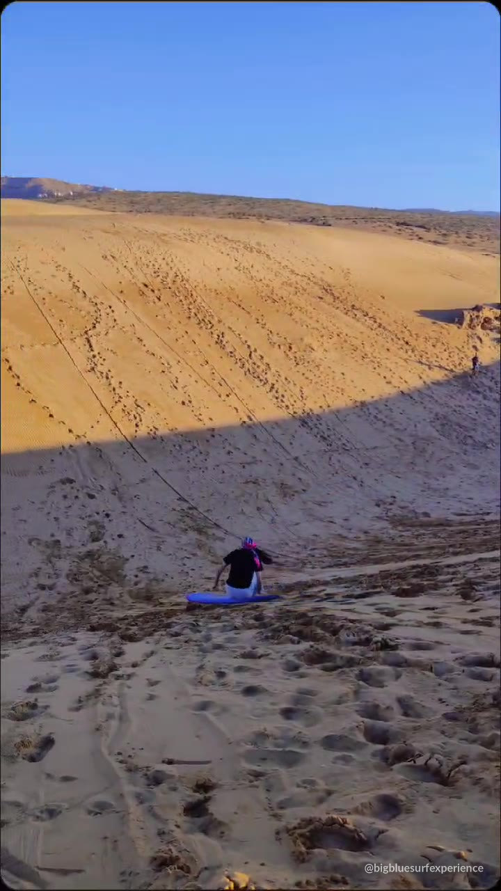 Group sandboarding on the Timlaline dunes